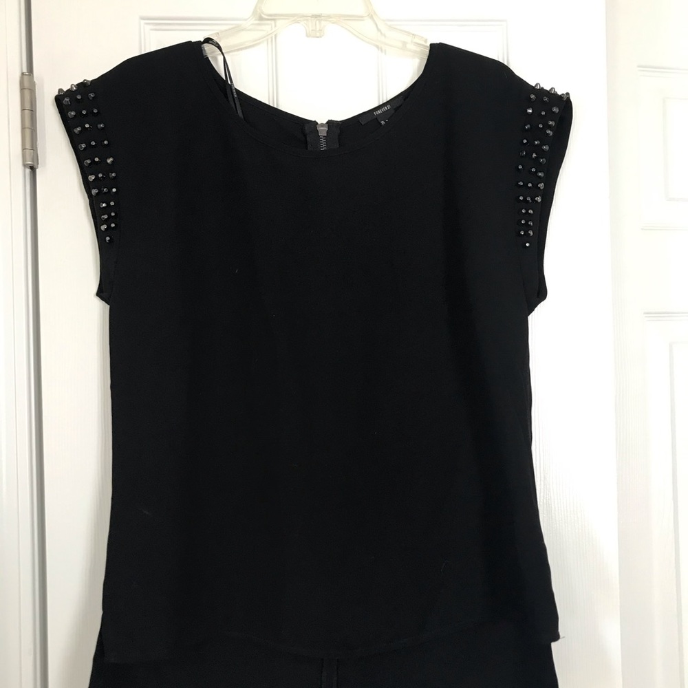 Black shirt with stud details on sleeves